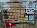 a metal cart with a bunch of boxes on top of it