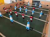 a foosball table in the middle of a room