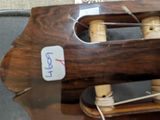 a guitar that is sitting on top of a table