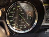 a close up of a speedometer in a car
