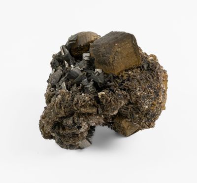 a small piece of rock that is on a white surface