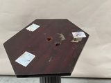 an image of a wooden table with stickers on it
