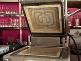 a machine that is sitting on a counter in a kitchen