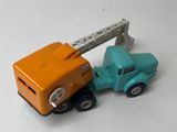 a toy truck with a crane attached to it ' s back