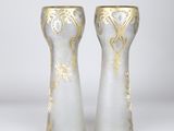 pair of antique glass vases with gold designs on them