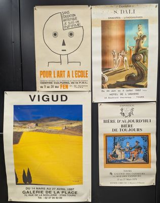 several posters on the wall of a public restroom in france