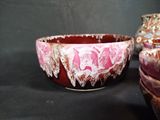 three bowls that are sitting on a table
