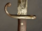 a close up of a knife with a metal handle