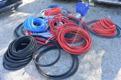 a lot of hoses that are sitting on the ground