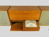 an image of a wooden stereo system with speakers and a record player