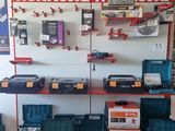 many tools on the wall in the shop