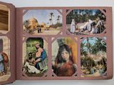 an open book with pictures of people and animals in it