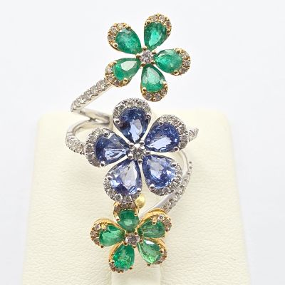 an image of a close up of a ring with a flower design