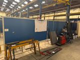 an image of a factory with a large blue screen