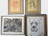 three framed pictures of dogs and a cat on a wall