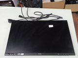 a laptop that is sitting on a white table