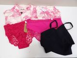 three panties and a tote bag sitting on a table