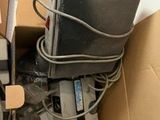 a box full of electronics and a remote in it