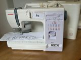 a sewing machine that is sitting on a table
