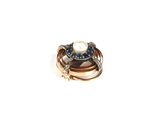 an image of a close up of a ring on a white surface
