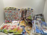 many bags of different types of paper on the counter
