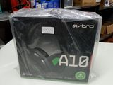 a box of gaming headsets on a table in a store