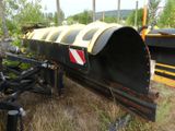 a black and yellow tractor with a yellow and white stripe on it