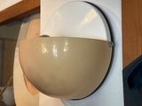 a picture of a wall mounted light fixture on a wall