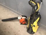 un nettoyeur haute pression et un souffleur jaunes et noirs posés par terre