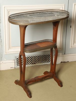 a wooden table with a metal tray on top of it