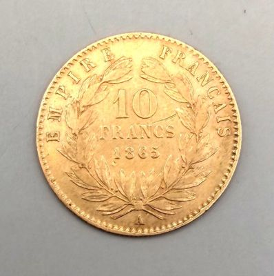 l'image d'une pièce d'or sur laquelle figure le chiffre 10
