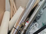 a box full of wrapping materials sitting on the floor
