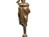 a bronze statue of a woman holding a vase on a stand