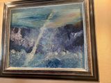 a painting hanging on the wall of a room