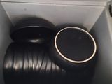 plates and bowls in the bottom of a refrigerator