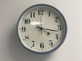 a clock hanging on the wall in a room