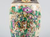an image of a vase with a painting on it sitting on a table