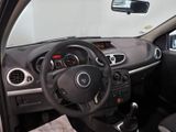 a picture of a car dashboard with a steering wheel