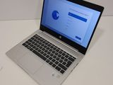 a laptop computer that is sitting on a table