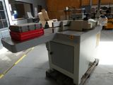 a machine that is sitting on a pallet in a warehouse