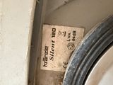 a picture of a dirty washer with a label on it