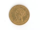 l'image d'une pièce d'or sur laquelle figure une tête de femme
