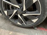 a close up of a tire on a car ' s rim