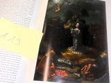 une photo d'un livre sur lequel figure une image de Jésus