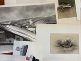 a lot of drawings on the floor of this room