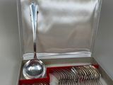 a box with a set of silverware in it