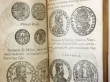 a book with a bunch of coins on it