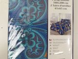 a close up of a package of blue and orange bedspread covers