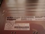 an image of a close up of a metal device with a barcode on it