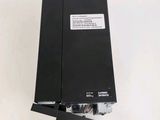 the back of a laptop with a hard drive attached to it